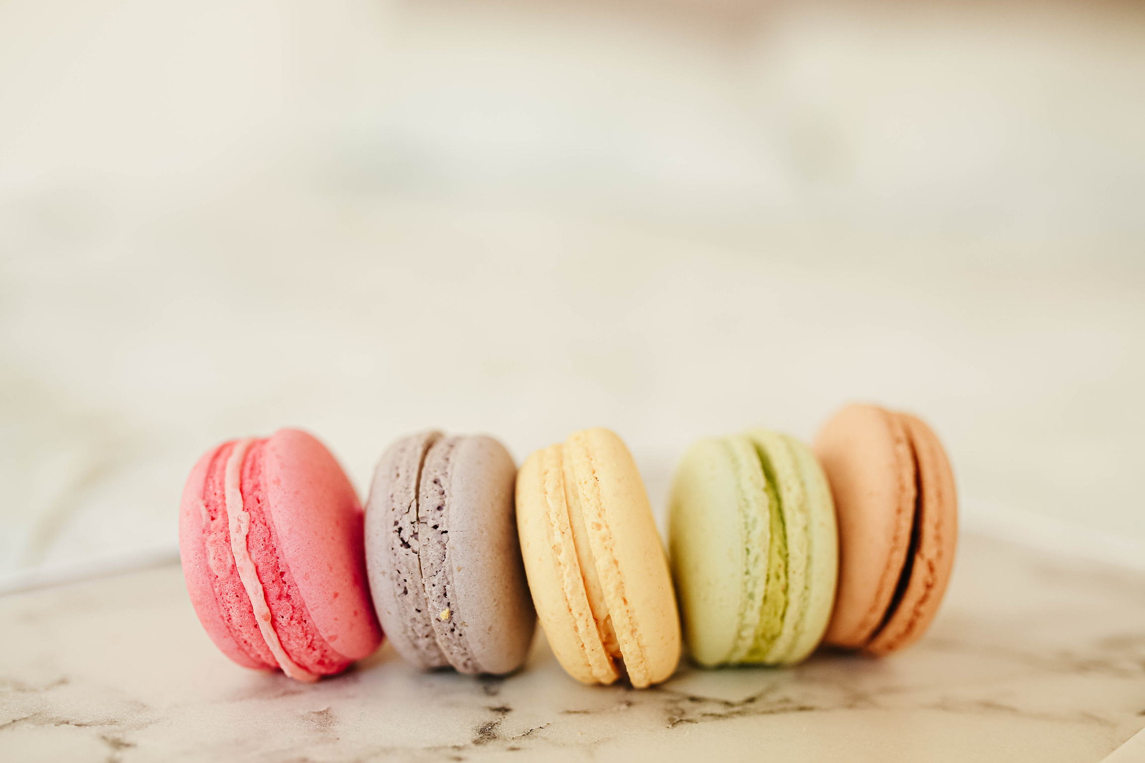 Pastel Colored Macaroons on Surface 